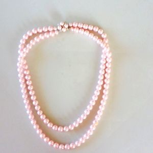 Women's pale pink pearl necklace